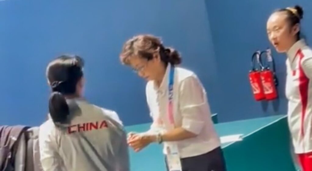 Shocking Video Surfaces On Social Media Showing Chinese Gymnastics Judge Performing Questionable Act With Team China After Awarding Medal