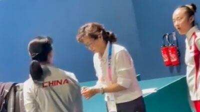 Olympics gymnastics judge with Team China