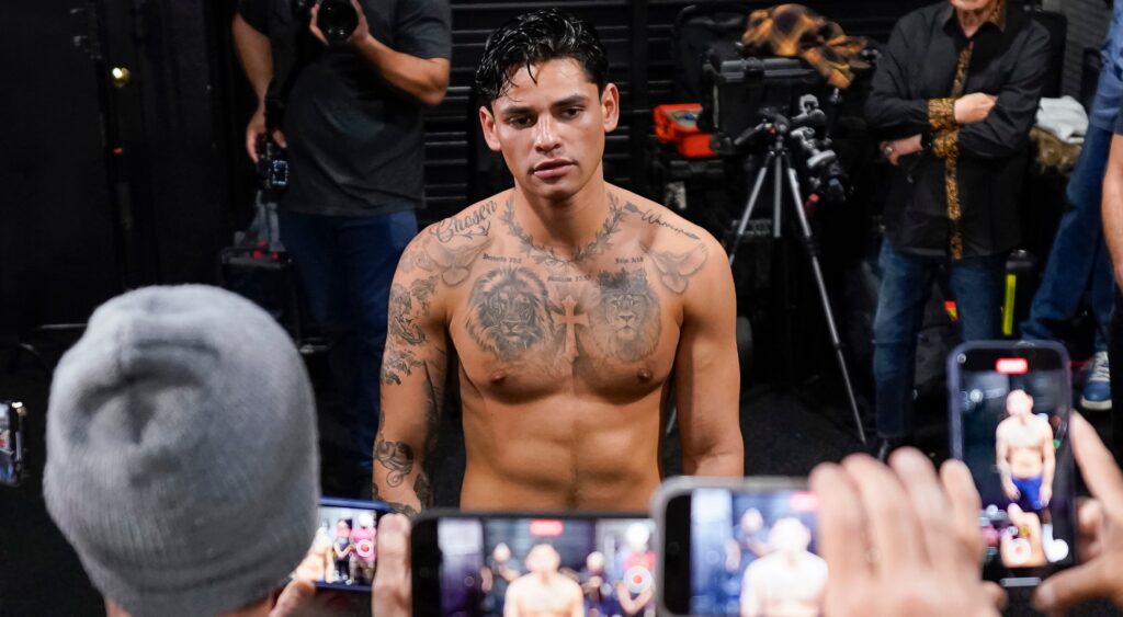  Ryan Garcia speaks to reporters during a media workout