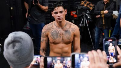 Ryan Garcia speaks to reporters during a media workout