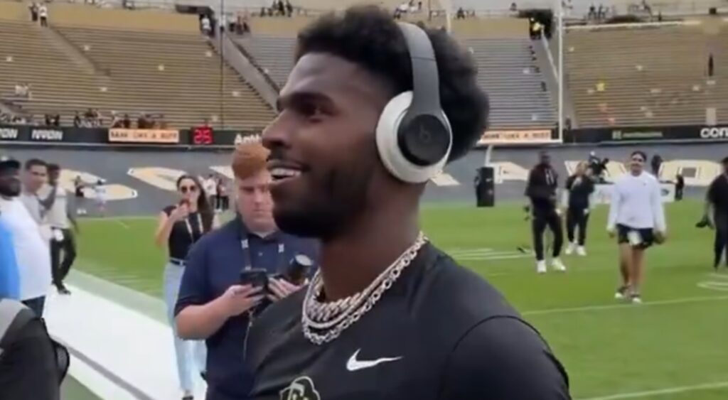 Shedeur Sanders looking at fans while on the field