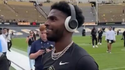 Shedeur Sanders looking at fans while on the field