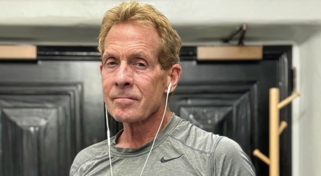 Skip Bayless posing in t-shirt