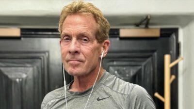 Skip Bayless posing in t-shirt