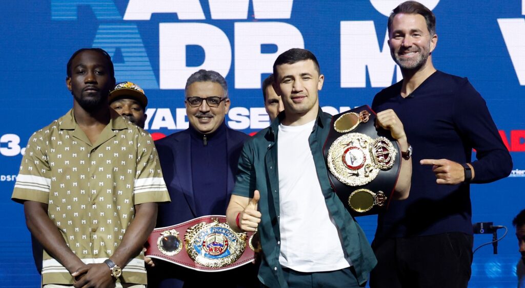 Terence Crawford poses with Israil Madrimov of during a press conference