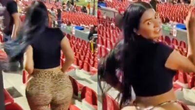 Woman twerking at baseball game