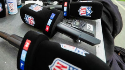 Photo of NFL mics for article on NFL reporters who passed away