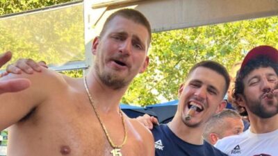 Nikola Jokic goes shirtless during celebration