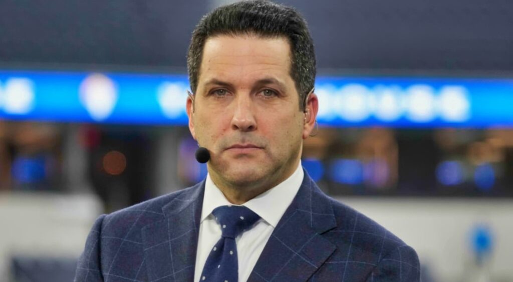 Adam Schefter looks at the camera.