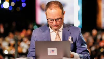 ESPN is considering two well-known NBA analysts to replace Adrian Wojnarowski following his retirement from the news industry