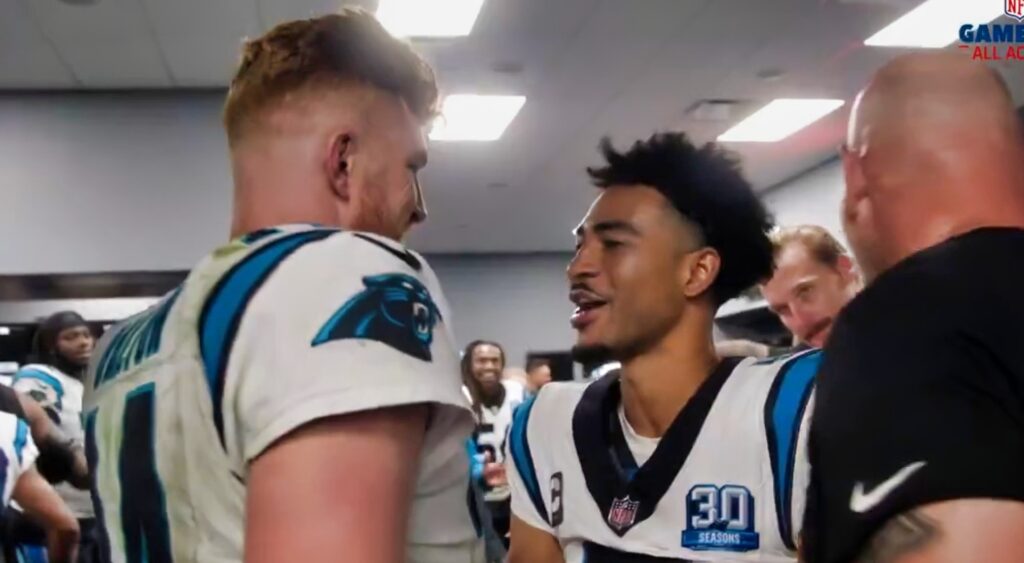 Andy Dalton and Bryce Young in the Panthers locker room.