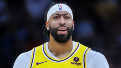 Anthony Davis of the Lakers walks back to his bench.