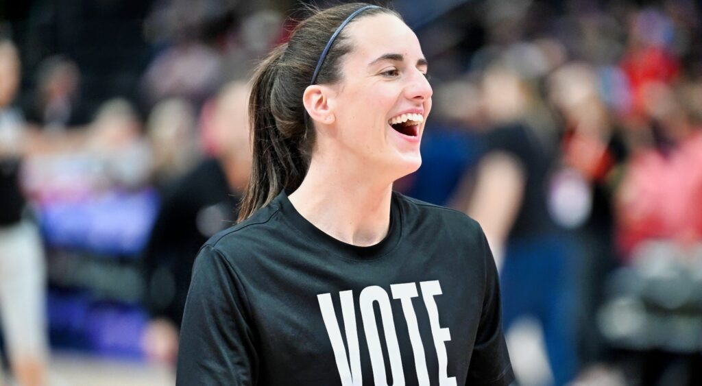 Caitlin Clark laughs during pregame warmups/