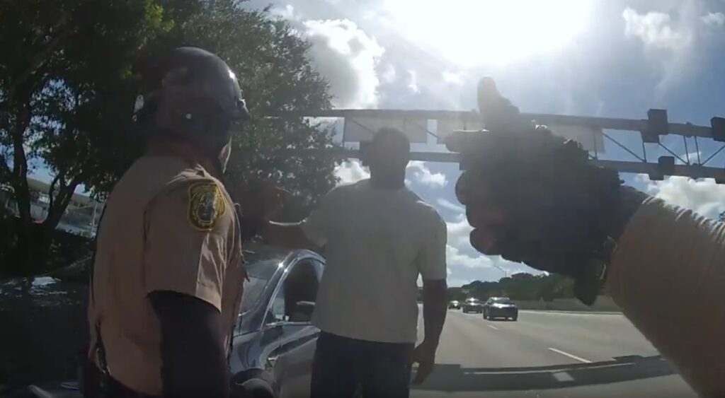 Calais Campbell with cops