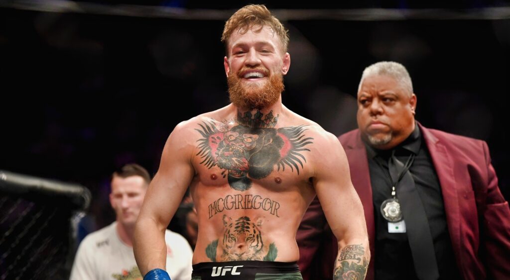 Conor McGregor smiling in the octagon