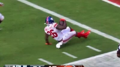 Devin Singletary sliding on turf