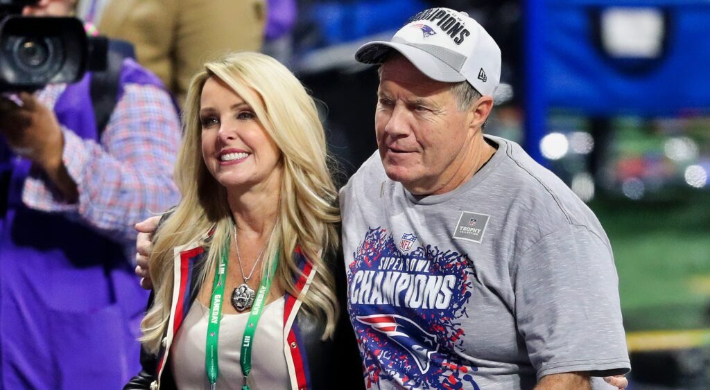 Linda Holliday and Bill Belichick on the field after the Super Bowl.