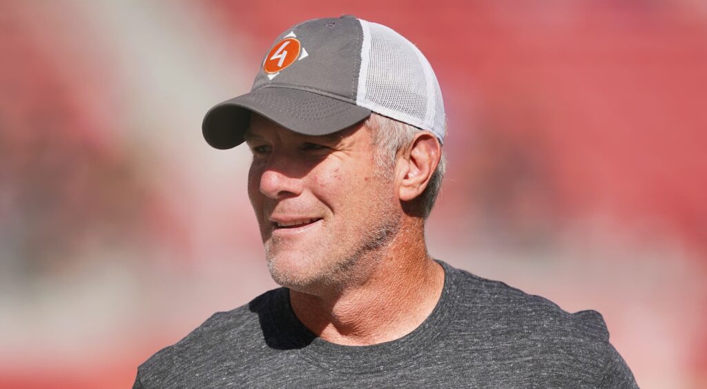 Brett Favre looking on at NFL game.