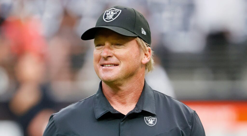 Las Vegas Raiders head coach Jon Gruden looking on.