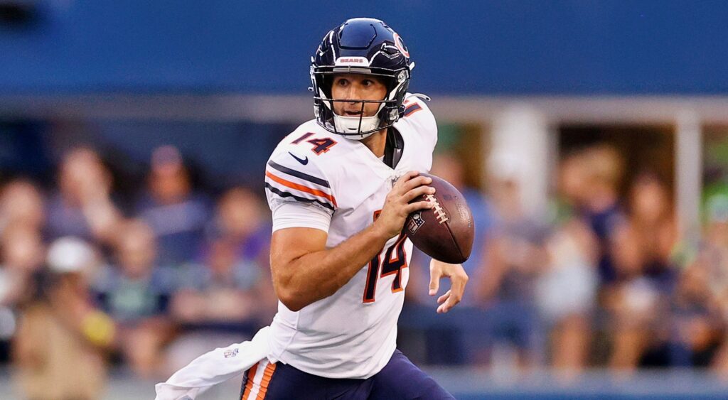 Nathan Peterman of Chicago Bears running with football.