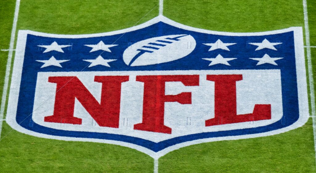 NFL Logo on the field. Aaron Rodgers was recently voted the most annoying player in the NFL.