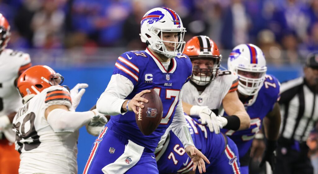 Josh Allen of Buffalo Bills running with football.