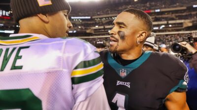 Eagles QB Jalen Hurts and Packers QB Jordan Love in uniform