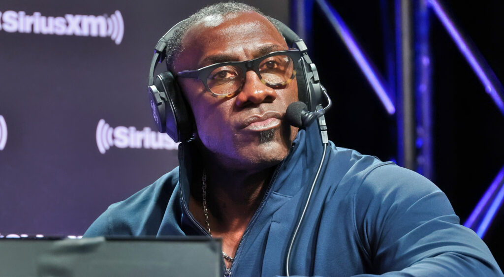 Shannon Sharpe with a headset on