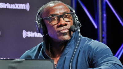 Shannon Sharpe with a headset on