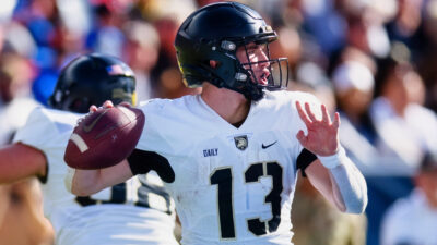 Bryson Daily throwing football