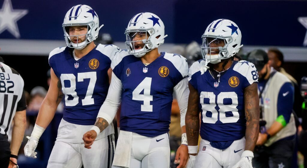 Dak Prescott, CeeDee Lamb, and Jake Ferguson in uniform