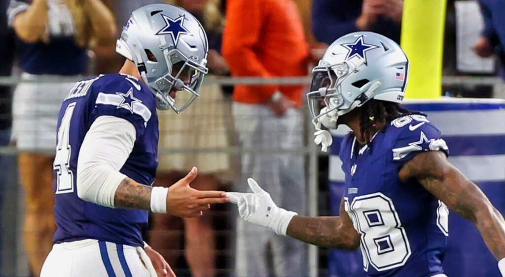 Dak Prescott and CeeDee Lamb of Dallas Cowboys celebrating a play.