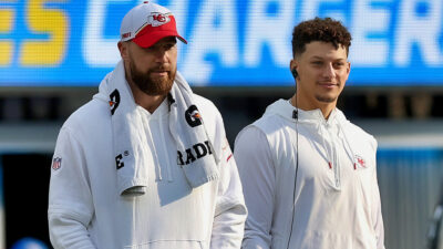 Travis Kelce next to Patrick Mahomes