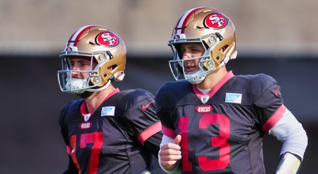 Brandon Allen and Brock Purdy of San Francisco 49ers looking on.