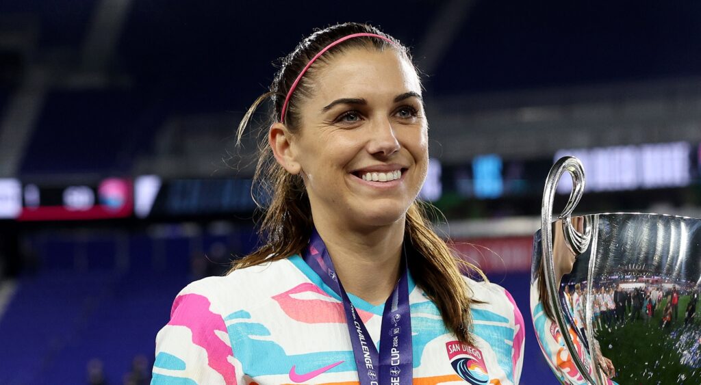 Alex Morgan taking a photo