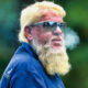 John Daly blowing smoke