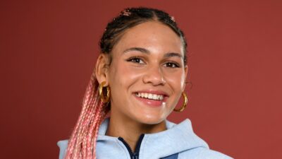 Trinity Rodman posing with medal