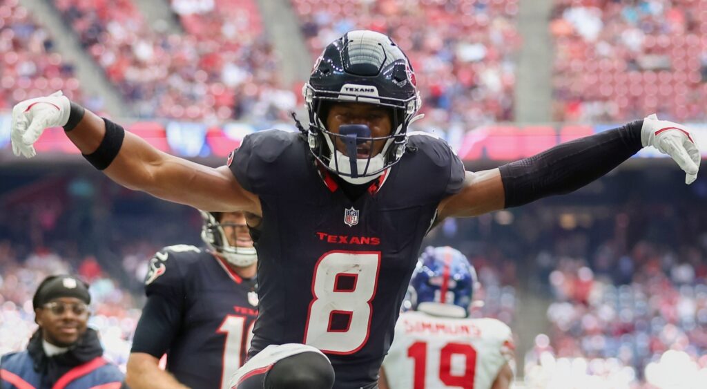 John Metchie III of Houston Texans celebrating a touchdown.