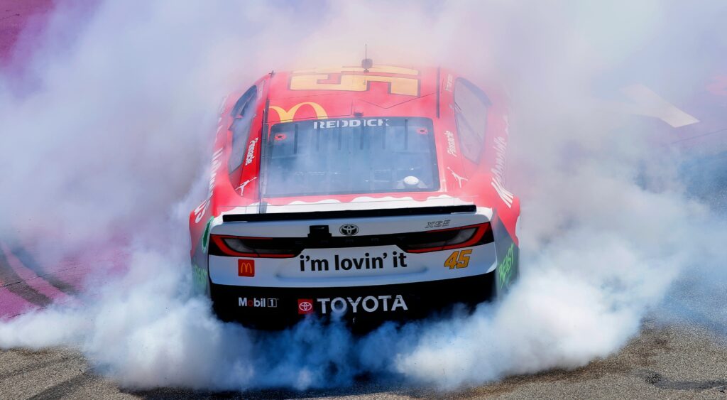 Tyler Reddick burning out in his car