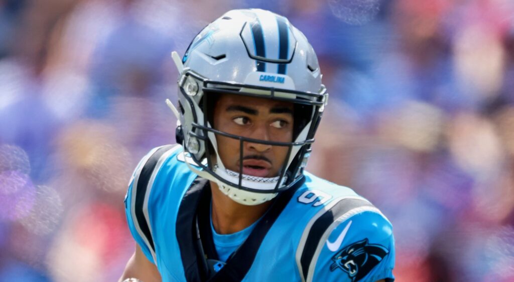 Bryce Young of Carolina Panthers running with football.