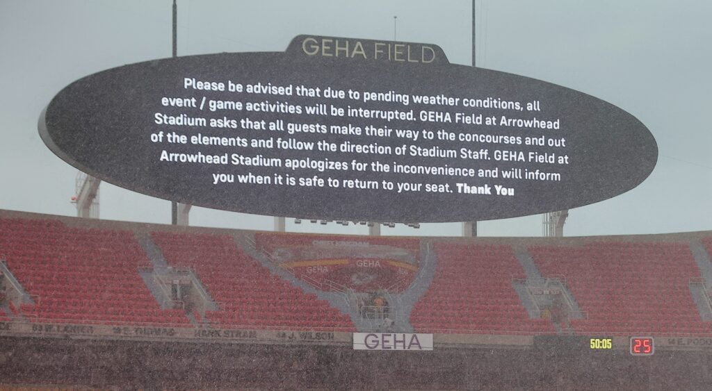 Sign at Kansas City Chiefs' home venue of Arrowhead Stadium announcing a weather delay.