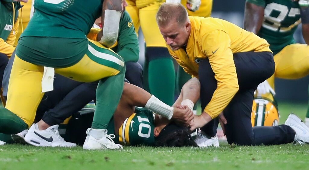 Jordan Love injured on the field.