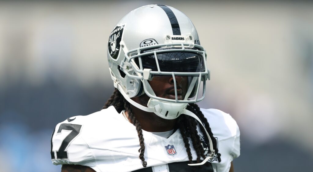 Davante Adams of Las Vegas Raiders looking on.