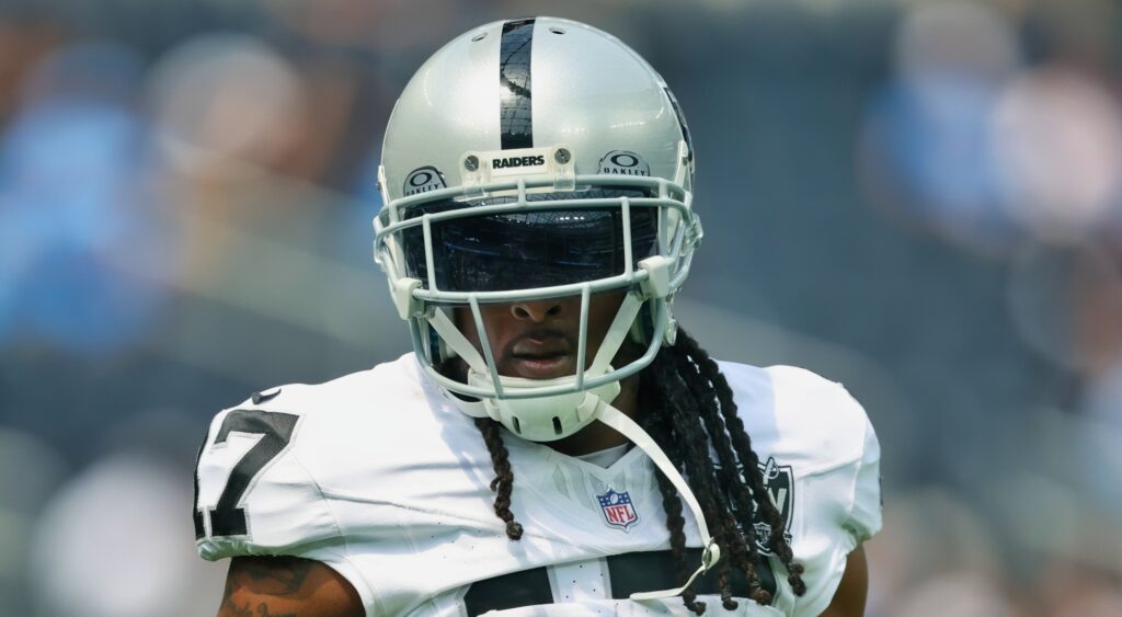 Davante Adams of Las Vegas Raiders looking on.