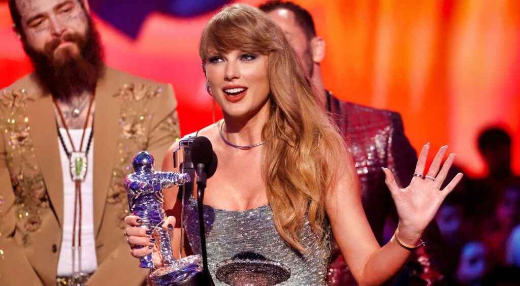 Taylor Swift giving a speech at the VMAs.