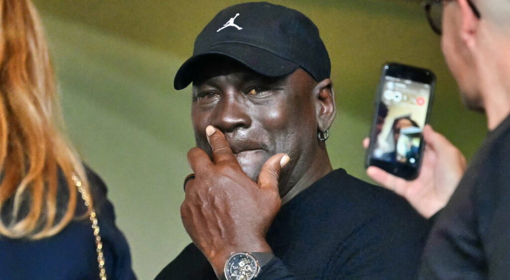 Michael Jordan with a hand on his face