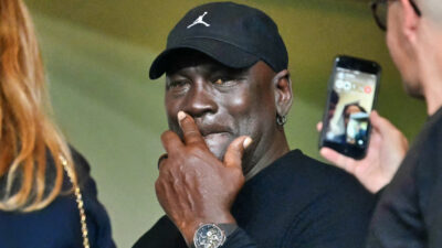 Michael Jordan with a hand on his face