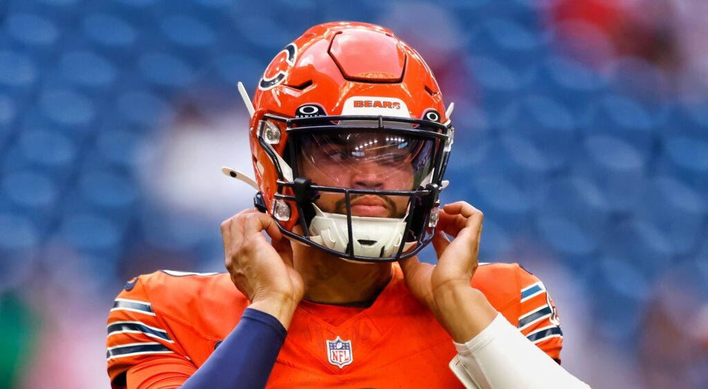 Caleb Williams of Chicago Bears looking on.