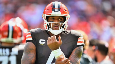 Deshaun Watson holding his forearm