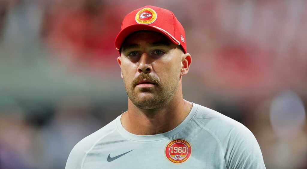 Travis Kelce of Kansas City Chiefs looking on.